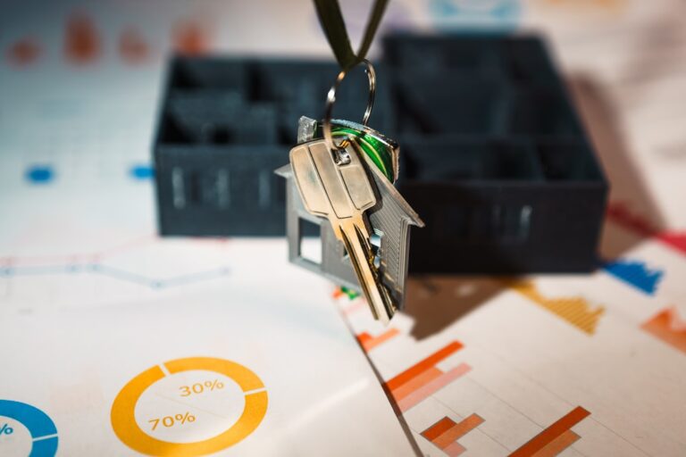 A person holding a rental inspection checklist inside an unfurnished apartment.